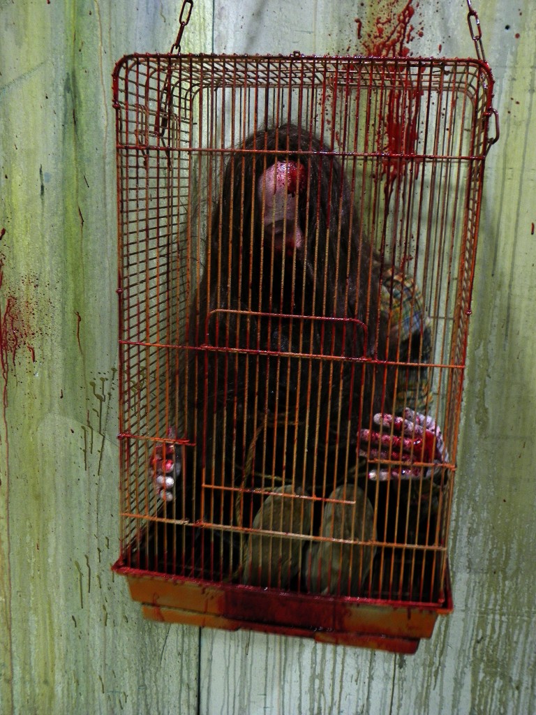 CAGED VICTIM PROP (WITH CAGE)