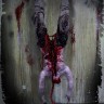 2016 BLOODY HEADLESS CHAINSAW VICTIM WITH HEAD AND CHAINSAW